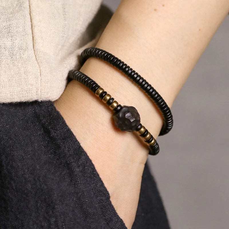 BESPOKE LAYERED CARVED EBONY BEAD AND SOLID COPPER BEAD BRACELET